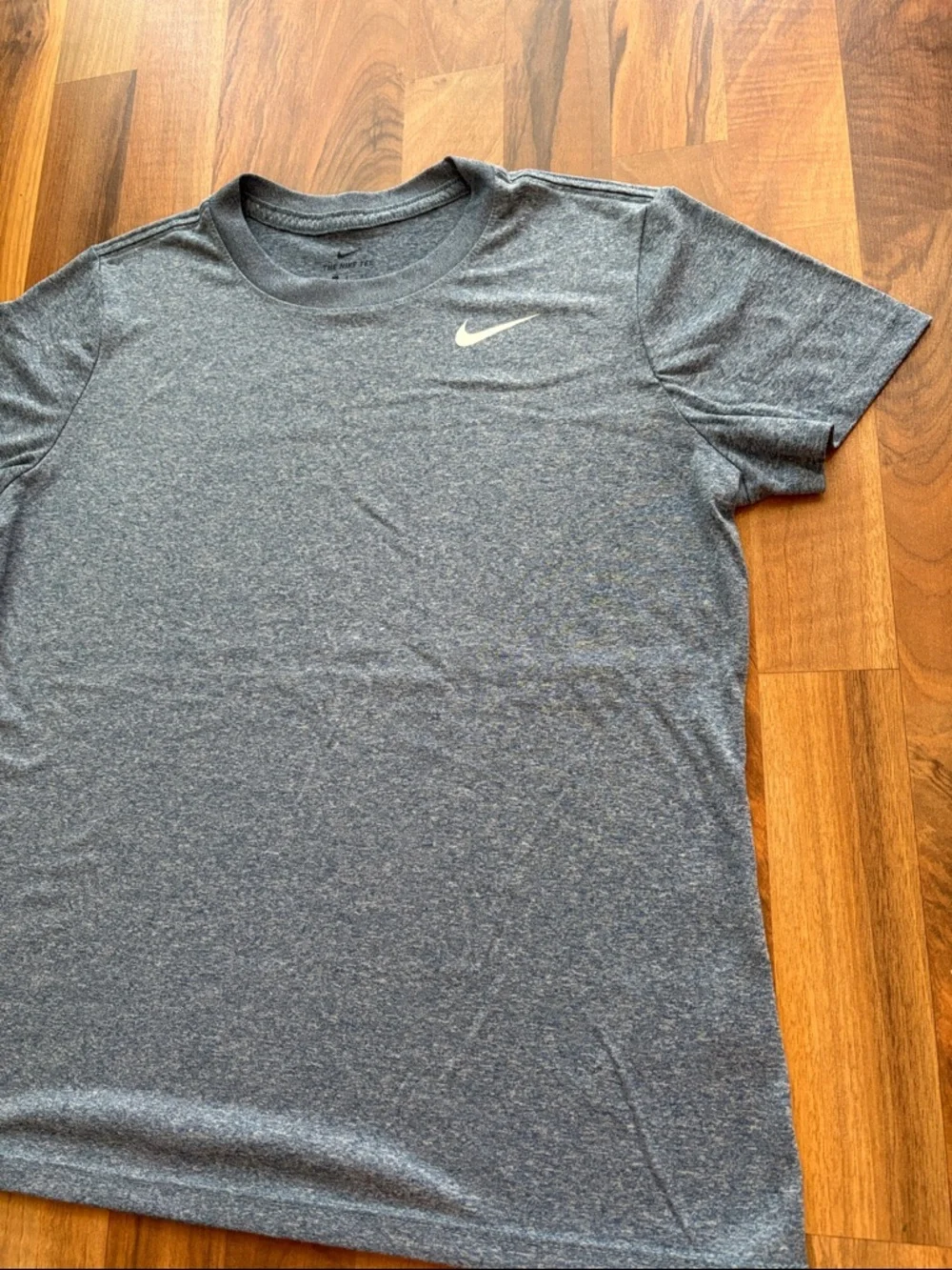 Nike Woman’s Gray/Blue Heather Performance Tee with White Swoosh